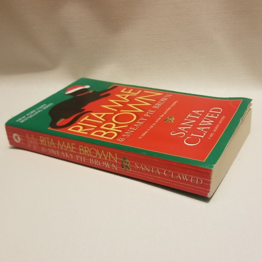 add to bundle $4, Rita Mae Brown's Santa Clawed paperback, VGUC - Picture 3 of 4
